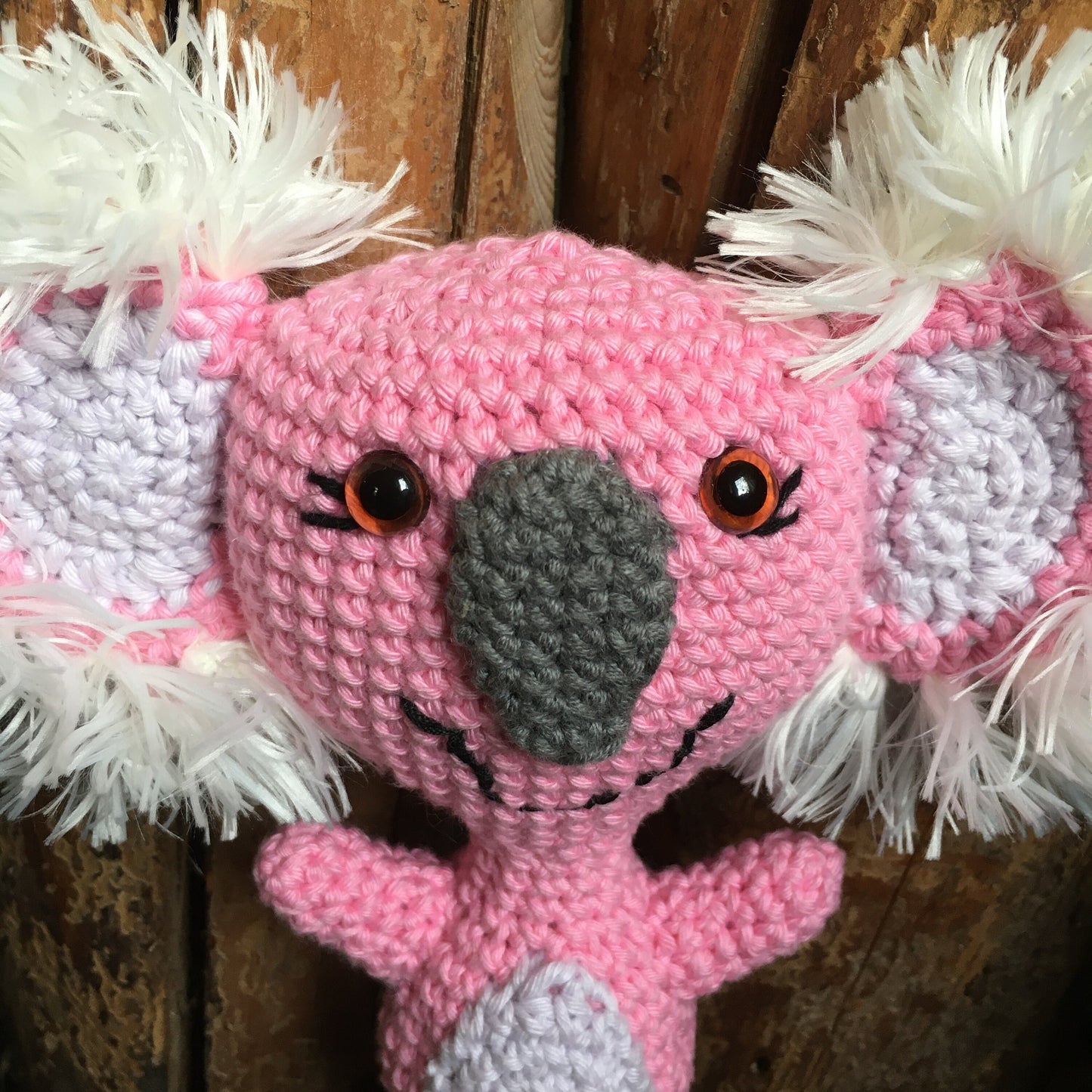 Ready to leave, koala plush in joyful mood, pink koala and lilac made of organic cotton